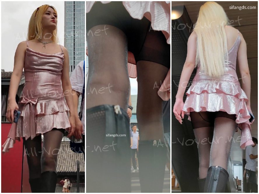 ピンクのドレスと黒いストッキングを着た美しい女性がボーイフレンドと一緒に買い物に来ます。彼女は白い下着を身につけています。