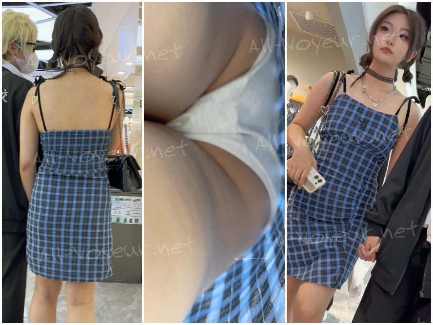 サンドドレスを着た若い女性が親友と一緒に買い物に出かけます。彼女のかわいいドレスとぴったりとした黒いランジェリーのコントラストが印象的です。