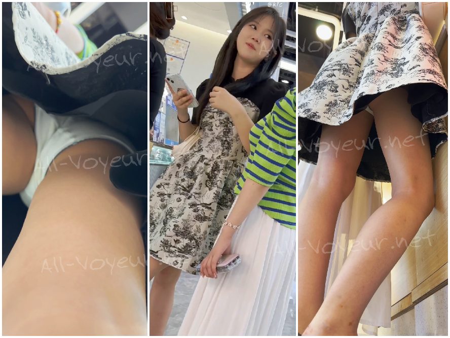 ロングスカートをはいた女子生徒がルームメイトと買い物に出かける。ローアングルの高画質 CD に、黒の縁取りの白い下着が映っている。