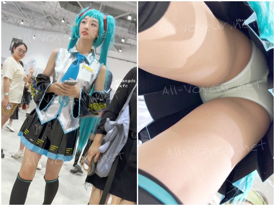 短いスカートをはいた可愛い女の子とボーイフレンドが街を散歩しています。ピンクの下着をローアングルの高解像度ビューで撮影しました。