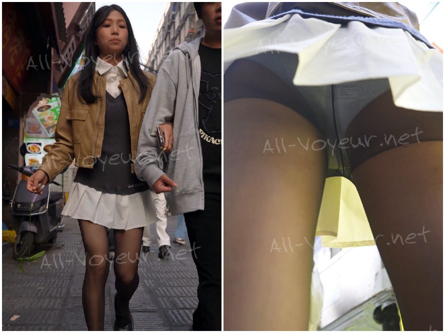 ピンク髪のメイド服を着た若い女性が買い物に出かけます...彼女の白い漫画の下着は彼女を無邪気でセクシーに見せます。