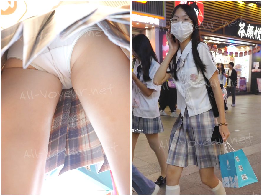 制服姿の女子高生がスクラッチ宝くじを買いに行く…爽やかなピンクの服からは13本の縫い目が見える。