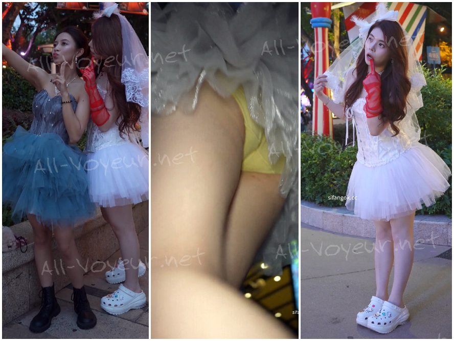 レースのウェディングドレスを着た美しい女性がコンサートに出席しています...CD プレーヤーのライトが点灯し、彼女の淡い黄色の下着が照らされます。