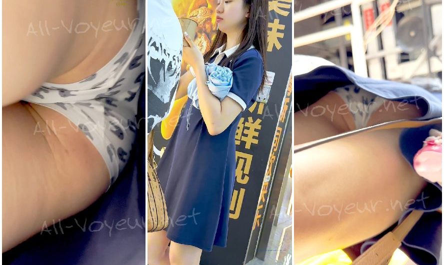 長いスカートを履いた女子学生が一人で買い物に出かけ、お菓子を買っている。彼女は白い下着を身につけており、両面にCDを持っている。