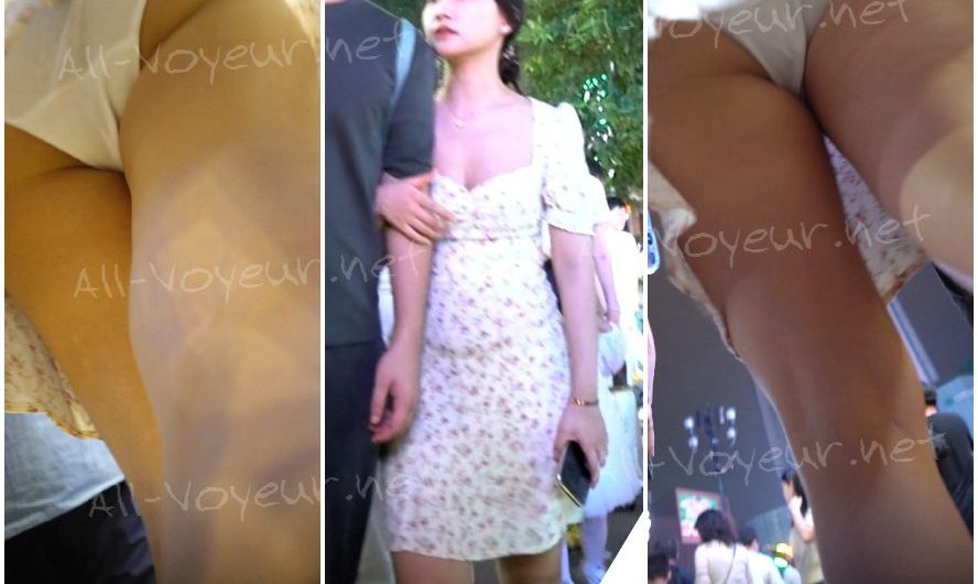 （原文：孔成）ドレスを着た若い女性が胸の半分を露わにし、やや透け感のある白いドレスがふっくらとしたヒップを包み込んでいる。[ある不動産会社からの原文]